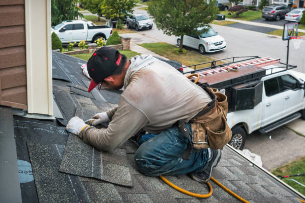 Professional Emergency Roof Repair technician working in Attica, NY